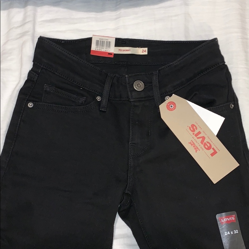 Levi’s 711 Skinny Mid Rise Black Jeans